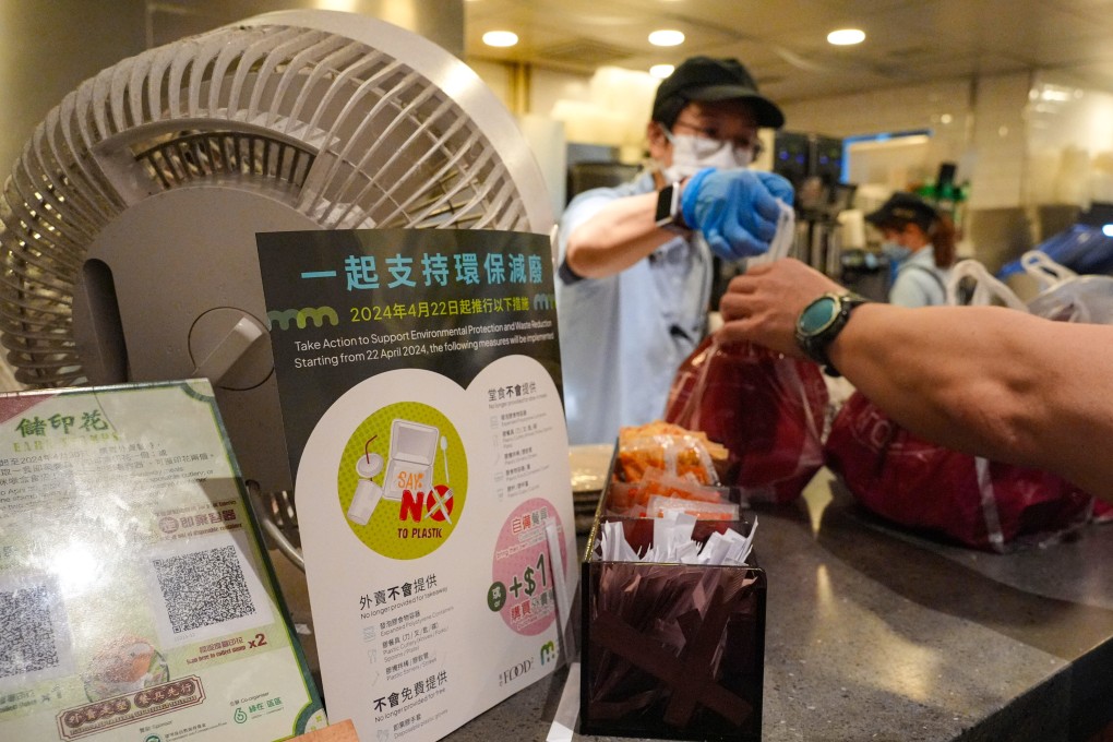 An educational sign about the ban at a catering business in Kowloon Bay. Photo: Eugene Lee
