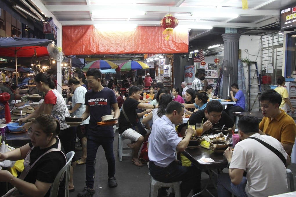 Hong Kee, which specialises in sticky claypot rice, in Kuala Lumpur’s Chinatown. The neighbourhood in the Malaysian capital has been reborn in recent years, with cutting-edge restaurants, bars and shops giving the area a new feel yet retaining its heritage. Photo: John Brunton