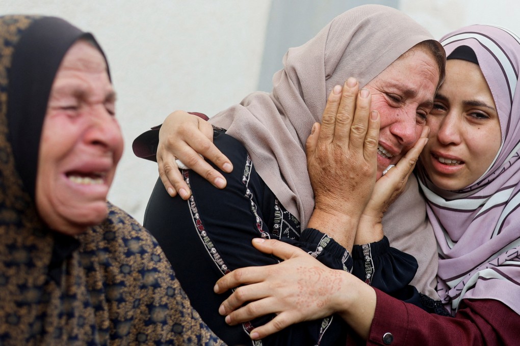 Women mourn near the bodies of Palestinians killed in Israeli strikes in Rafah, in the southern Gaza Strip. Photo: Reuters