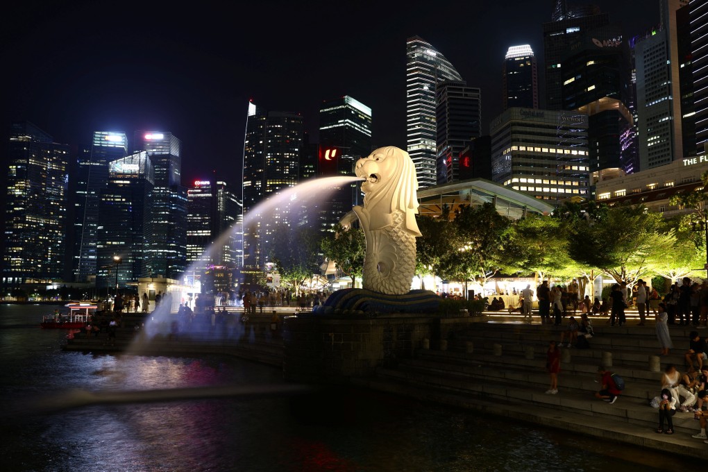 Singapore’s Merlion Park and central business district. The accused was upset about his girlfriend’s relationships with other men when he punched and kicked her, the court heard. Photo: Reuters