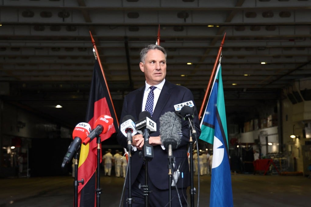 Australia’s Defence Minister Richard Marles prepares to speak aboard HMAS Canberra in Sydney on February 20. Photo: AFP