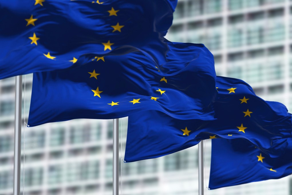 European Union flags fly outside the  organisation’s headquarters in Brussels, Belgium.