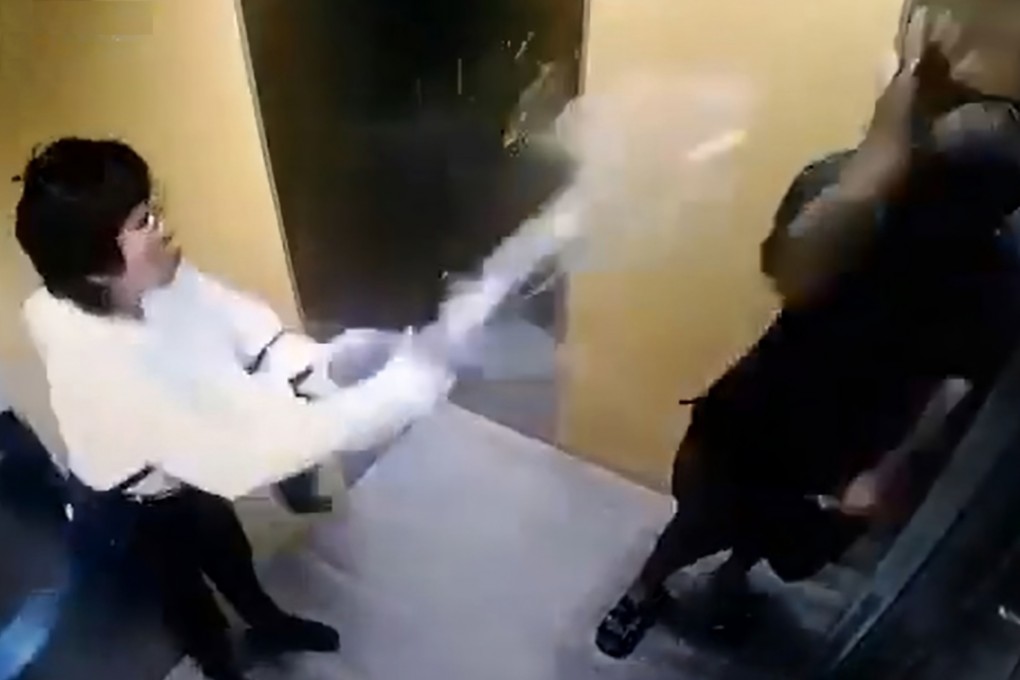 A still taken from surveillance footage shows the moment Oo Saw Kee threw scalding-hot water over a man with Down’s syndrome inside a lift in Malaysia on Friday. Photo: X/Ian_Collins_03