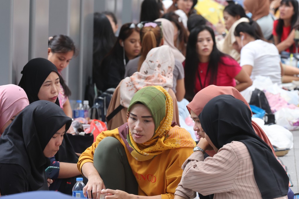 Indonesian domestic helpers gather during their day off at Mong Kok. Photo: Edmond So