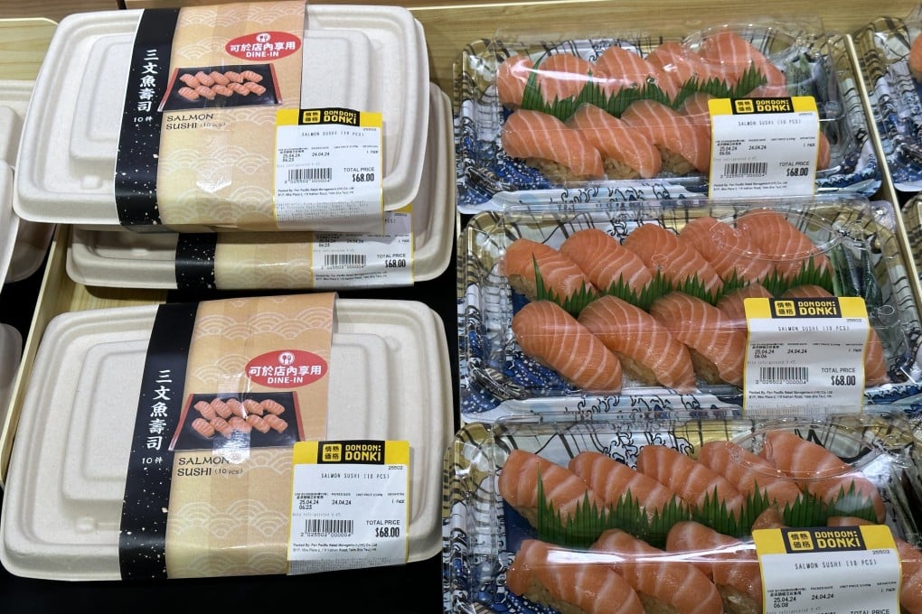 Cardboard sushi boxes for dine in customers sit alongside the usual see-through plastic containers at Don Don Donki. Photo: Jelly Tse