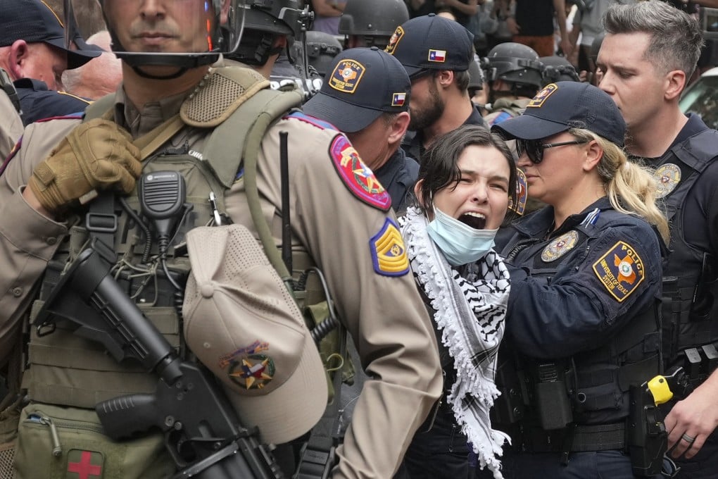 A woman being arrested at a pro-Palestinian protest at the University of Texas. Photo: Austin American-Statesman via AP