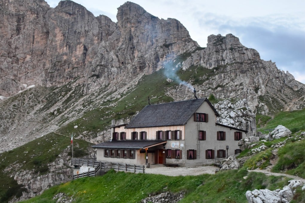 A view of Rifugio Coldai, a refuge for hikers in the Dolomites of northern Italy. A hike through the Dolomites involves some dizzying drops, but the reward is views of staggering beauty. Photo: Victoria Burrows