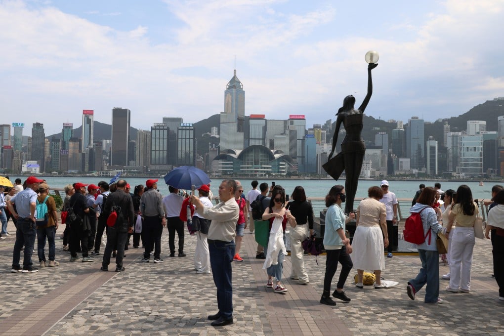 Tourists flock to the Tsim Sha Tsui waterfront, expected to be a top attraction for the Labour Day “golden week” holiday. Photo: Jelly Tse