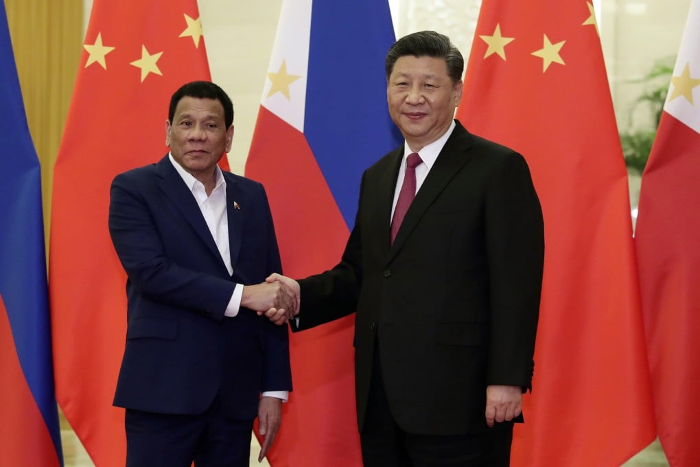 Rodrigo Duterte, then Philippine president, and Chinese President Xi Jinping shake hands before a meeting at the Great Hall of the People in Beijing on April 25, 2019. Photo: AP