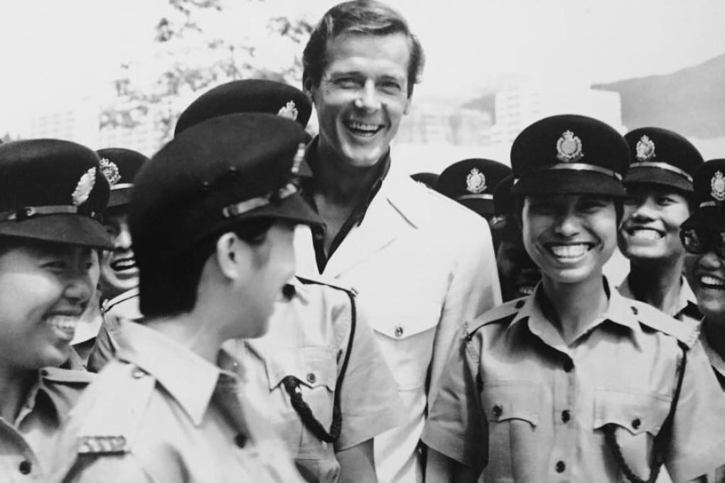 Roger Moore with policemen in Hong Kong, 1974. Photo: GIS/Handout
