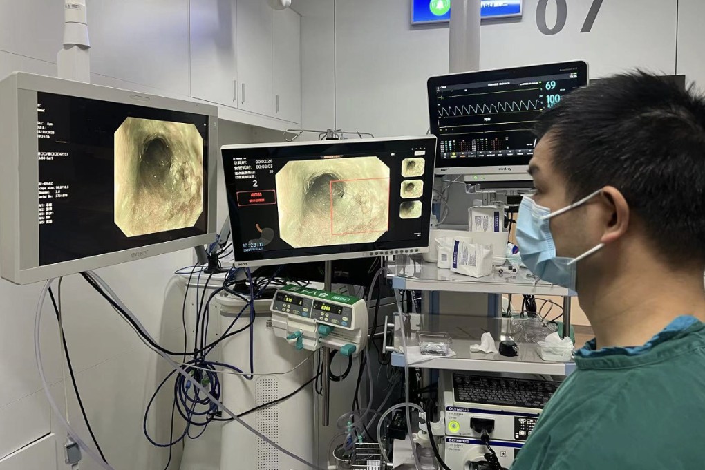 A doctor views an AI-aided map of oesophageal lesions during a trial. Photo: Mao Xinli
