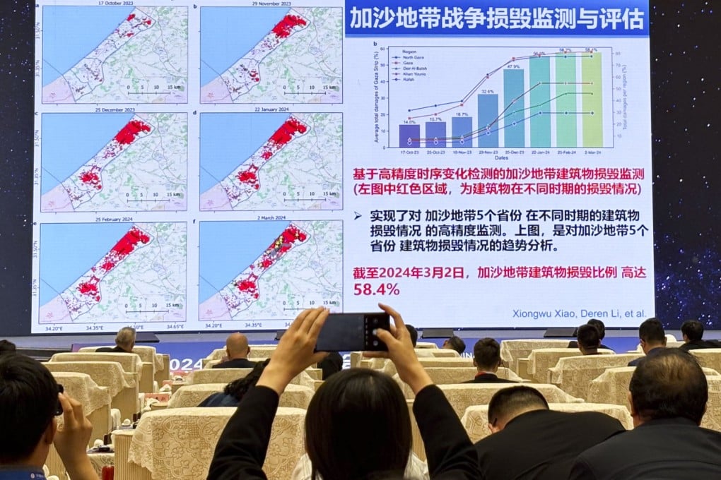 Li Deren from Wuhan University presents his teams findings on destruction in Gaza at the China Space Conference’s main on Wednesday. Photo: Handout