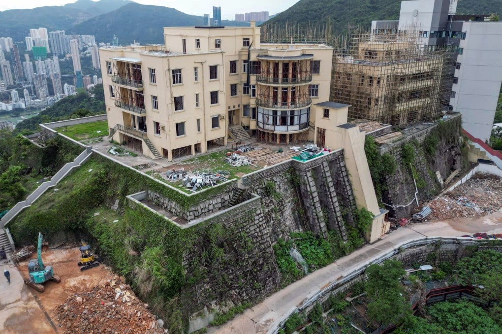 Construction is under way at the decades-old residential blocks Cameron Mansions, which is build on a former Japanese war memorial site. Photo: Dickson Lee