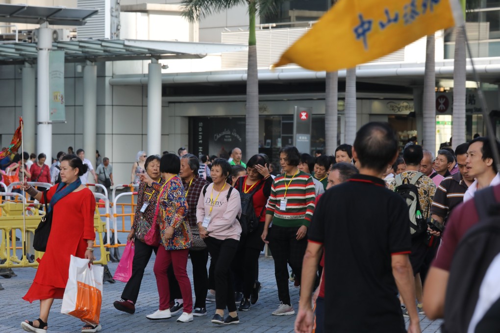 A tour group visits Hong Kong. Photo: K. Y. Cheng
