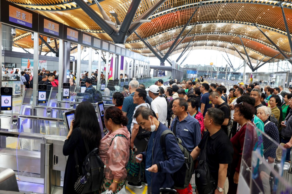 Travellers head out of the city via the Hong Kong port of the Hong Kong-Zhuhai-Macau Bridge. Photo: Yik Yeung-man