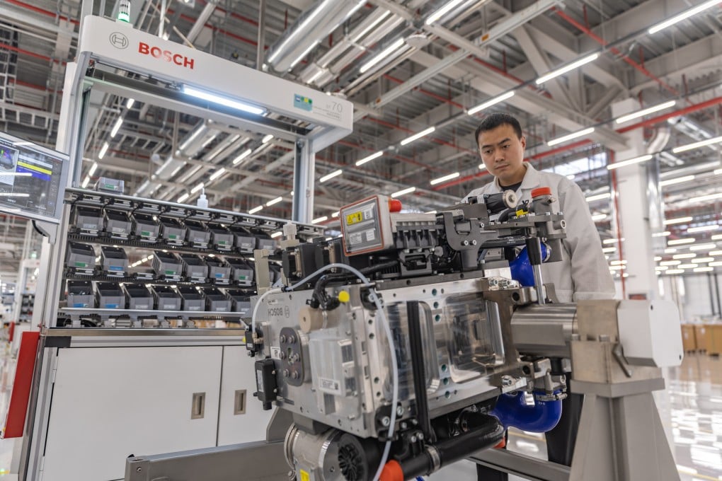 A worker operates equipment at Bosch Hydrogen Powertrain Systems, a Chinese-German joint venture in Chongqing, on April 14. China may emerge as a powerful player in the hydrogen economy next. Photo: Xinhua