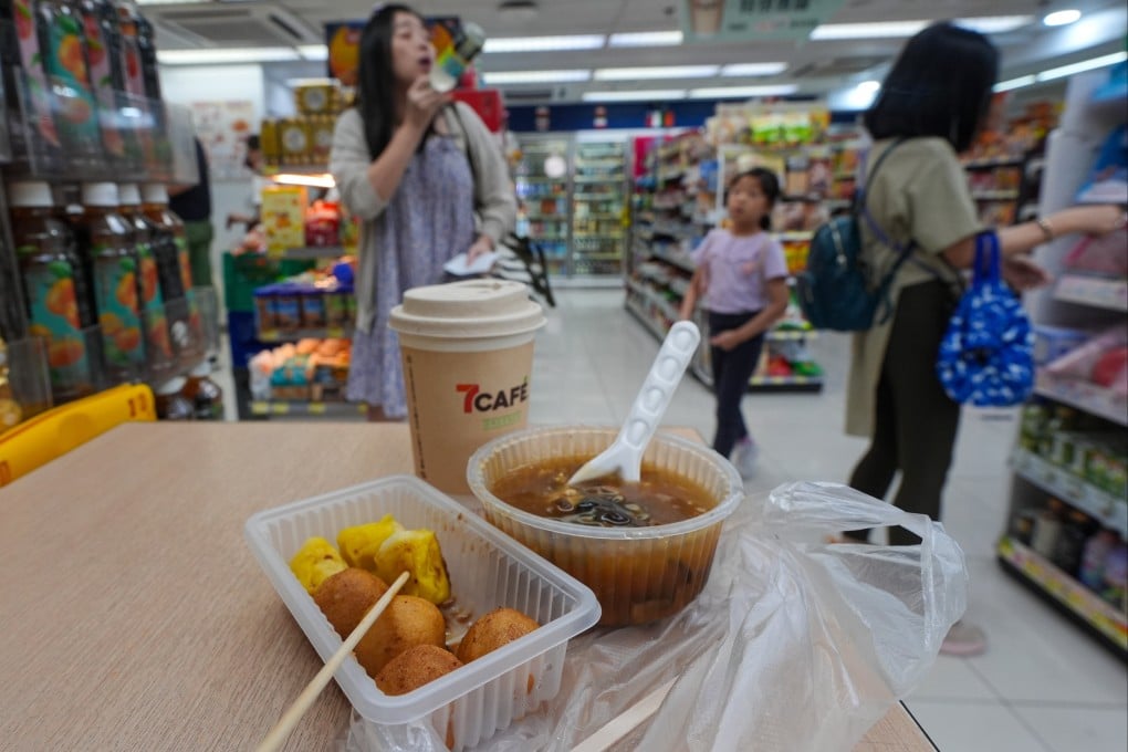 Throwaway plastic boxes are provided at 7-Eleven snack bars as confusion reigns over whether eating in stores counts as ‘dining in’. Photo: Eugene Lee