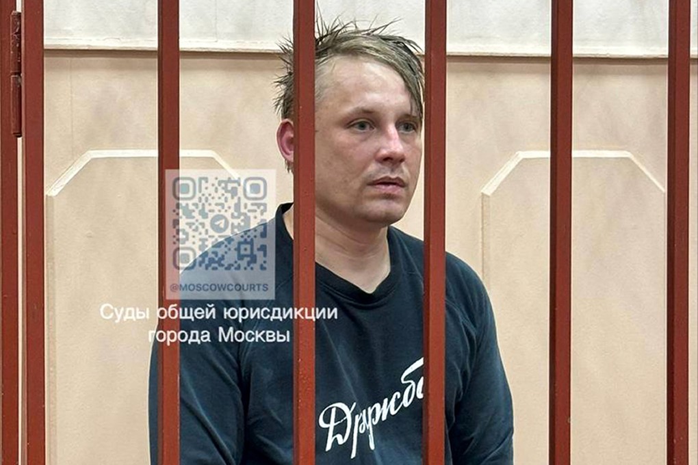 Russian journalist Konstantin Gabov attends a hearing at a court in Moscow, after his arrest on “extremism” charges, which he denied. Photo: AP