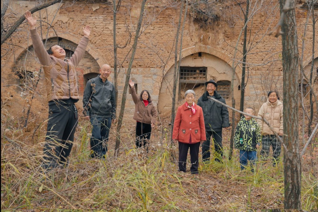 Zhang Xiuying (centre), grandmother of filmmaker Zhao Yehui, with fellow former residents of a village in China’s Shanxi province founded by her great-grandfather, in a still from May the Soil Be Everywhere. Photo: Zhao Yehui