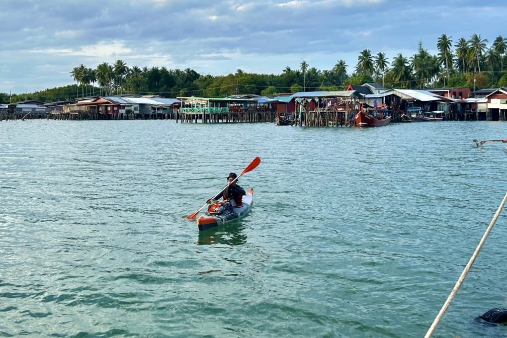 Kayaking past a fishing village on Koh Phu Island, along Thailand’s Andaman coast. Seeing the coast in this way enables travellers to absorb the nature and culture in a lesser-known part of the country. Photo: Ian Neubauer