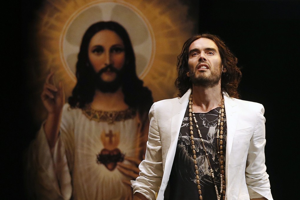 Russell Brand at his Messiah Complex show in London in 2014. The British comedian said on Monday that he had been baptised as a Christian at the weekend. Photo: Reuters