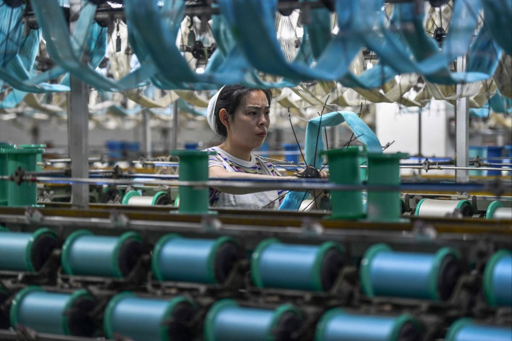 China’s official manufacturing purchasing managers’ index (PMI) stood at 50.4 in April compared to 50.8 in March. Photo: AFP