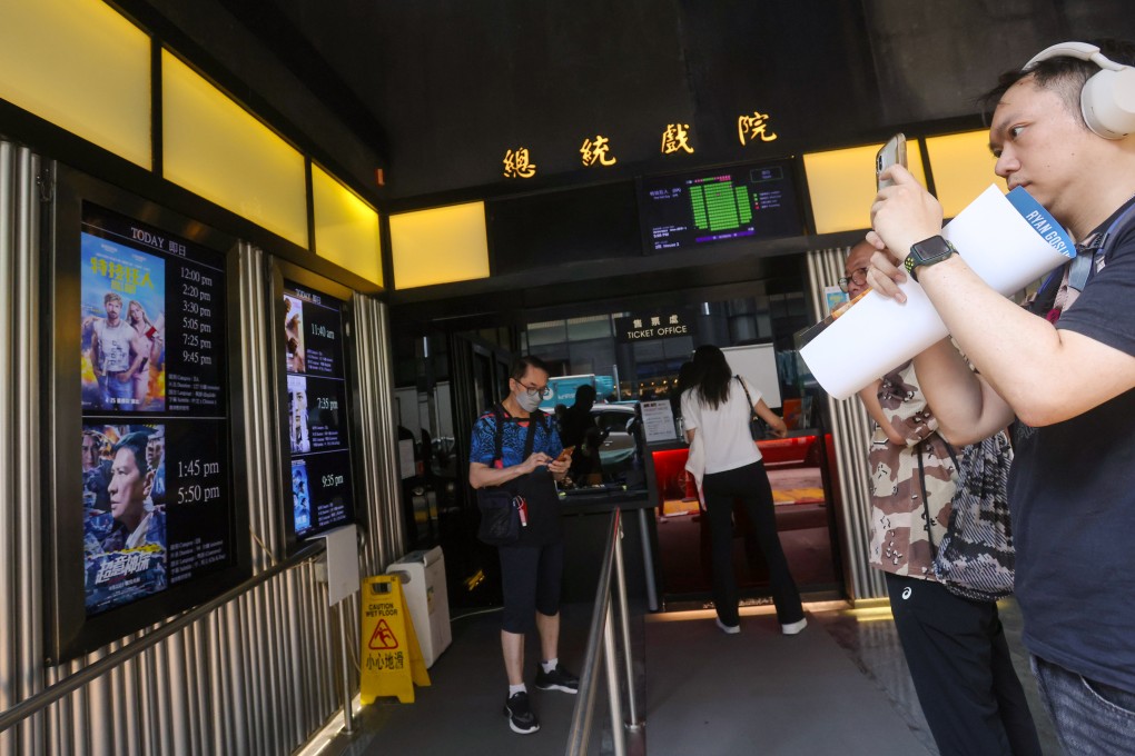 People visit President Theatre in Causeway Bay on Monday. The cinema shut its doors on Tuesday after nearly six decades in business. Photo: Jonathan Wong