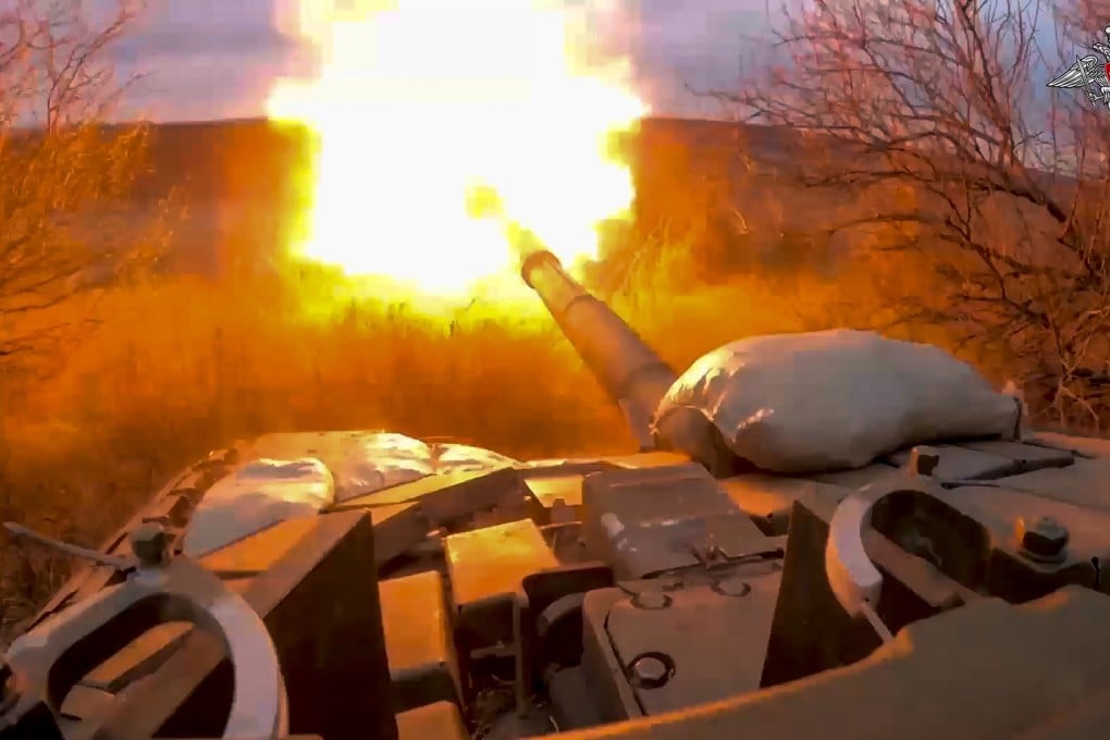 A Russian tank firing at Ukrainian troops from a position near the border with Ukraine in Russia’s Belgorod region. File photo: Russian Defence Ministry Press Service via AP