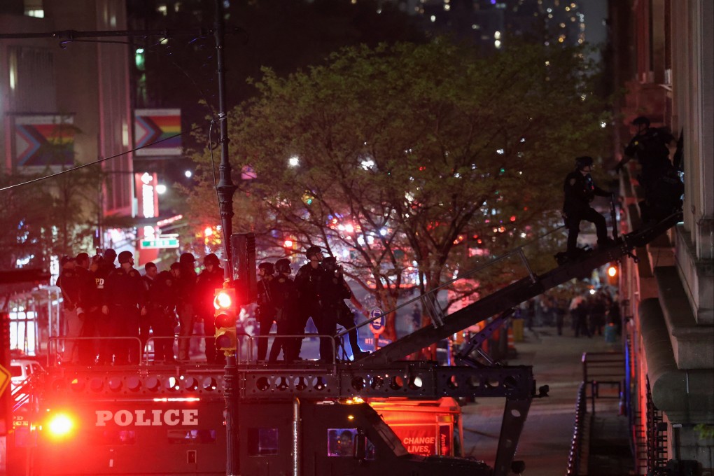 Police use a special vehicle to enter Hamilton Hall, which was occupied by protesters. Photo: Reuters