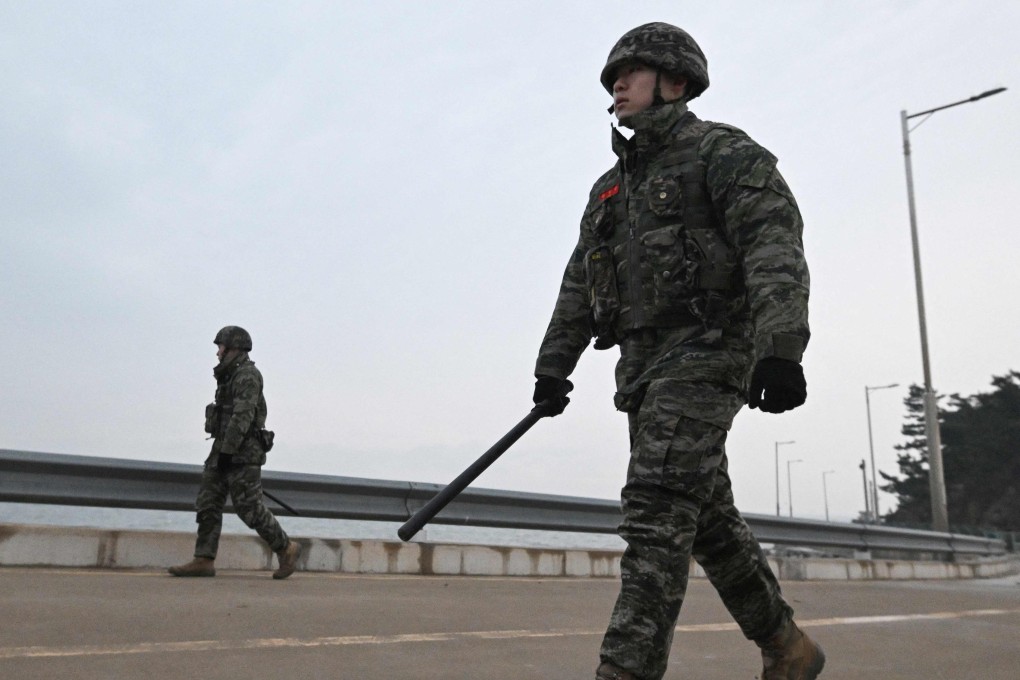 South Korean marines patrol a coastal road on Yeonpyeong island, near the “northern limit line” sea boundary with North Korea. Seoul has been reluctant to commit itself in the event of a Taiwan crisis, despite being an American ally. Photo: AFP