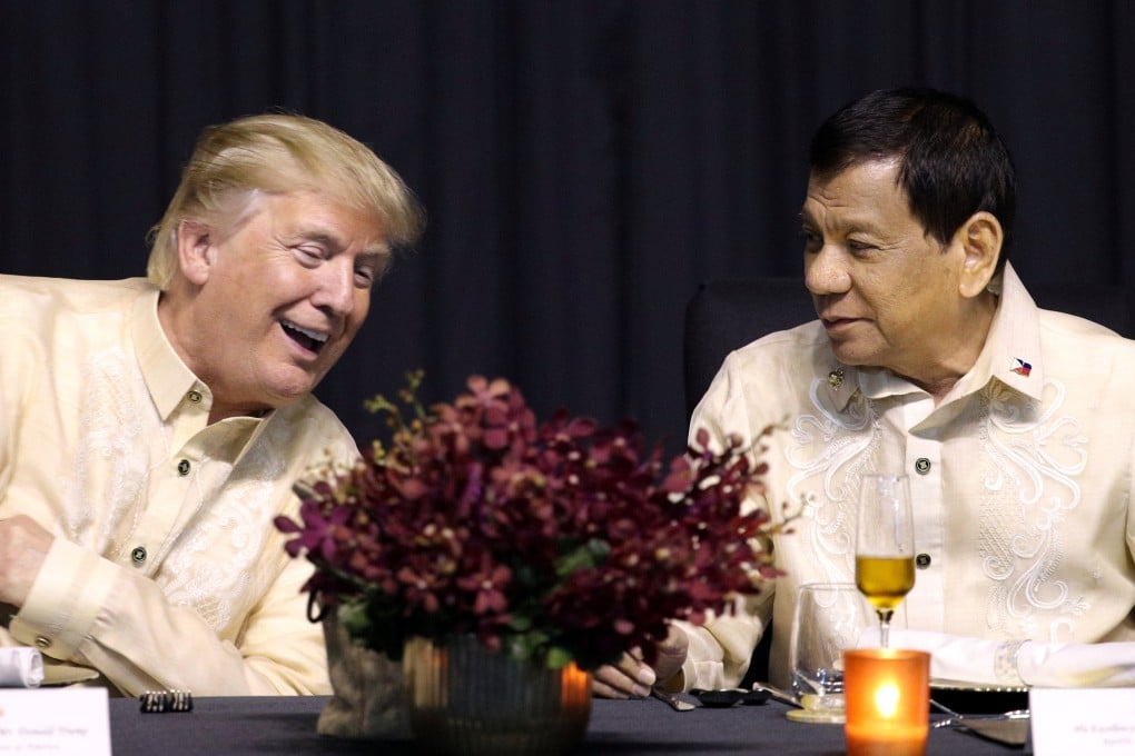 Former US President Donald Trump speaks with former Philippines President Rodrigo Duterte during a dinner marking Asean’s 50th anniversary in Manila in 2017. Photo: Reuters