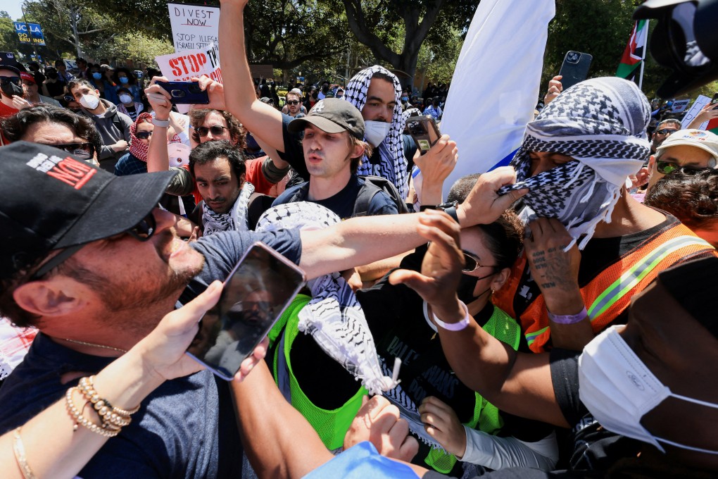 Pro-Israel protesters scuffle with those supporting Palestinians in Gaza, at the University of California Los Angeles on April 28. Photo: Reuters