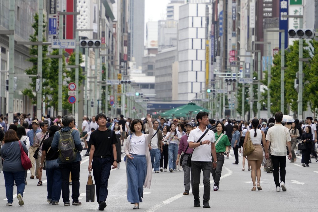 Shoppers walk through the main street of Ginza, Tokyo’s luxury shopping district. Japan’s largely homogenous population does not make the country xenophobic, an analyst says. Photo: EPA-EFE