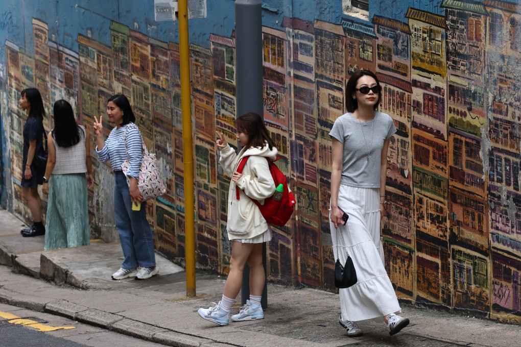 Tourists visit Central during the Labour Day holiday. Hong Kong welcomed a daily average of about 187,375 mainland tourists between May 1 and 3. Photo: Dickson Lee
