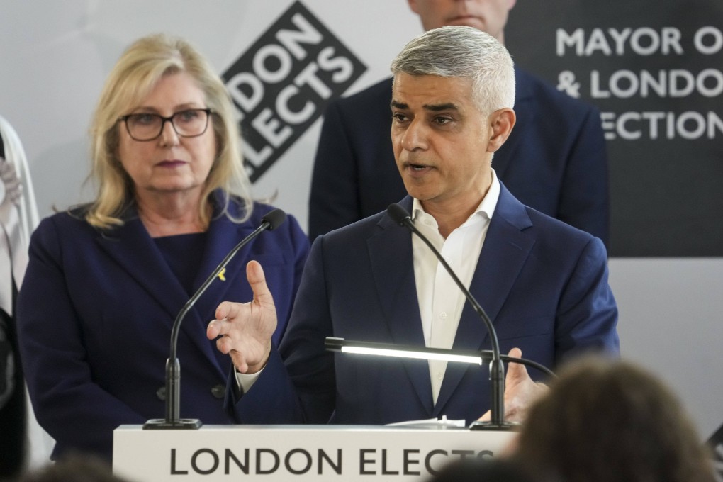 Labour’s Sadiq Khan speaks at City Hall after he is re-elected as the Mayor of London on Saturday. Photo: PA via AP