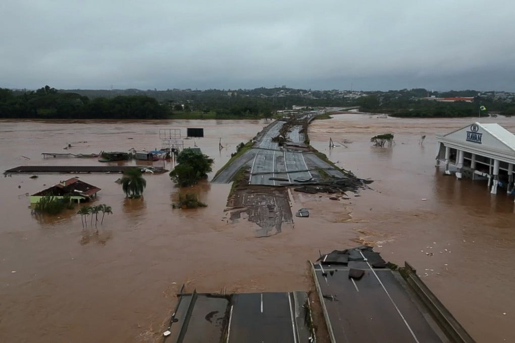 The flooded Taquari river bridge in Brazil’s Rio Grande do Sul state. Authorities have declared a state of emergency, with dozens of people dead and dozens more missing. Photo: Handout via Sao Paulo Civil Defence/AFP