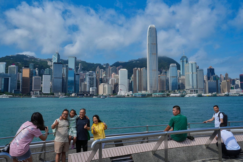 Visitors soak up the better weather on the final day of the “golden week” break after persistently poor conditions. Photo: Elson Li