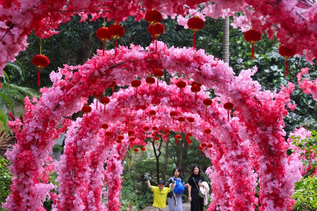 People enjoy a flower tunnel set up to celebrate the Lunar New Year at Hong Kong Park, Admiralty, on February 5. Photo: Dickson Lee