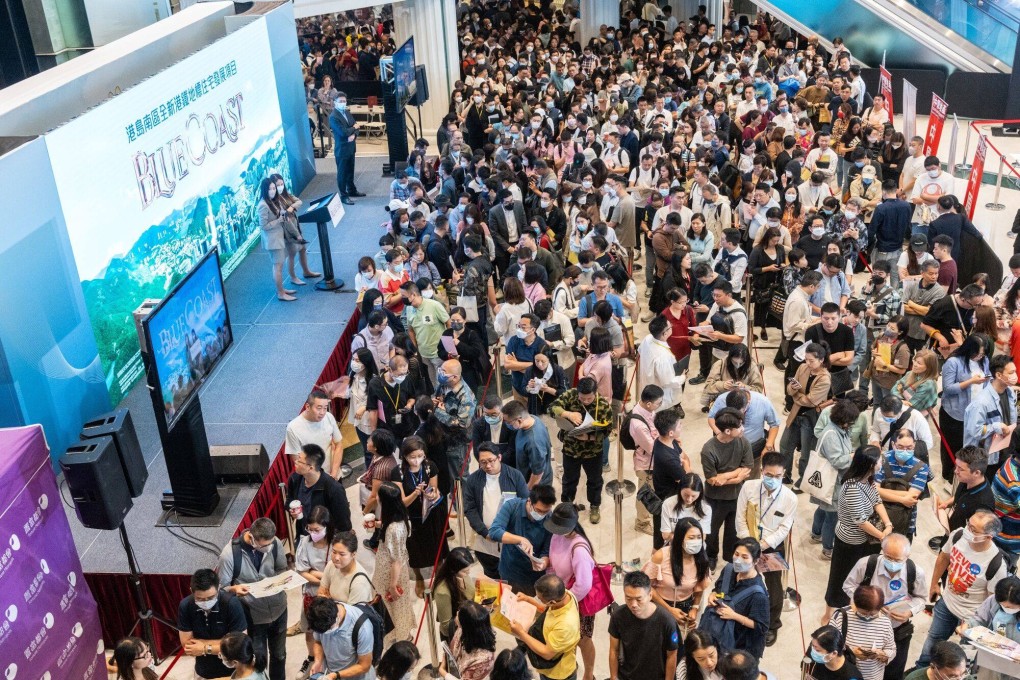 Prospective buyers stand in line at the sales office for the Blue Coast housing project, developed by CK Asset Holdings, in Hong Kong on April 6, 2024. Photo: Bloomberg