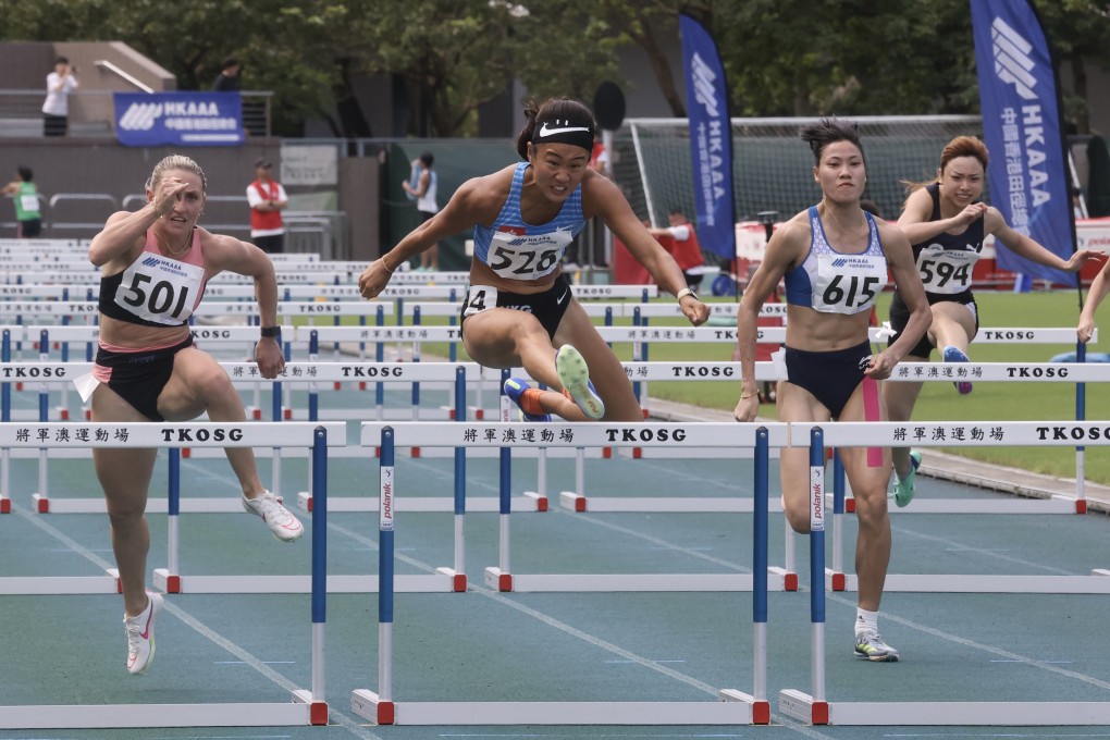 Vera Lui (No 526) is flanked by Abbie Taddeo (left) and Bui Thi Nguyen in the 100m hurdles final in Tseung Kwan O. Photo: Jonathan Wong