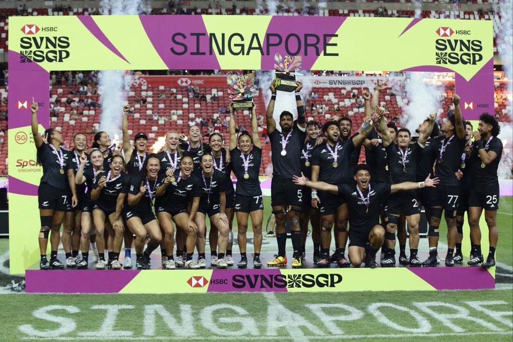 The victorious New Zealand teams celebrate more success in Singapore. Photo: AP