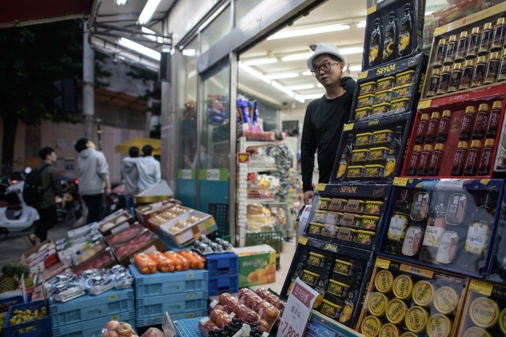 Fresh fruit and canned goods on display outside a supermarket in Seoul. Skyrocketing food inflation is a key concern for many South Korean voters. Photo: AFP