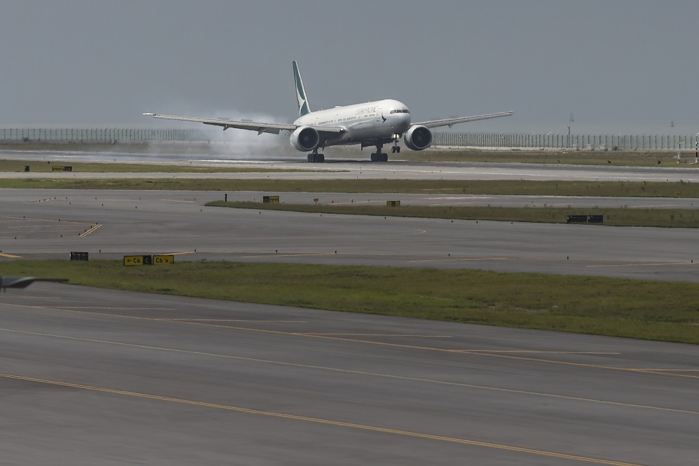 A Cathay Pacific jet touches down on Hong Kong’s new third runway. Photo: Yik Yeung-man