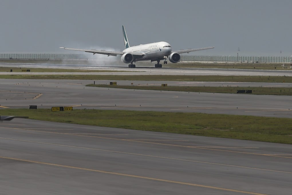 A Cathay Pacific jet touches down on Hong Kong’s new third runway. Photo: Yik Yeung-man