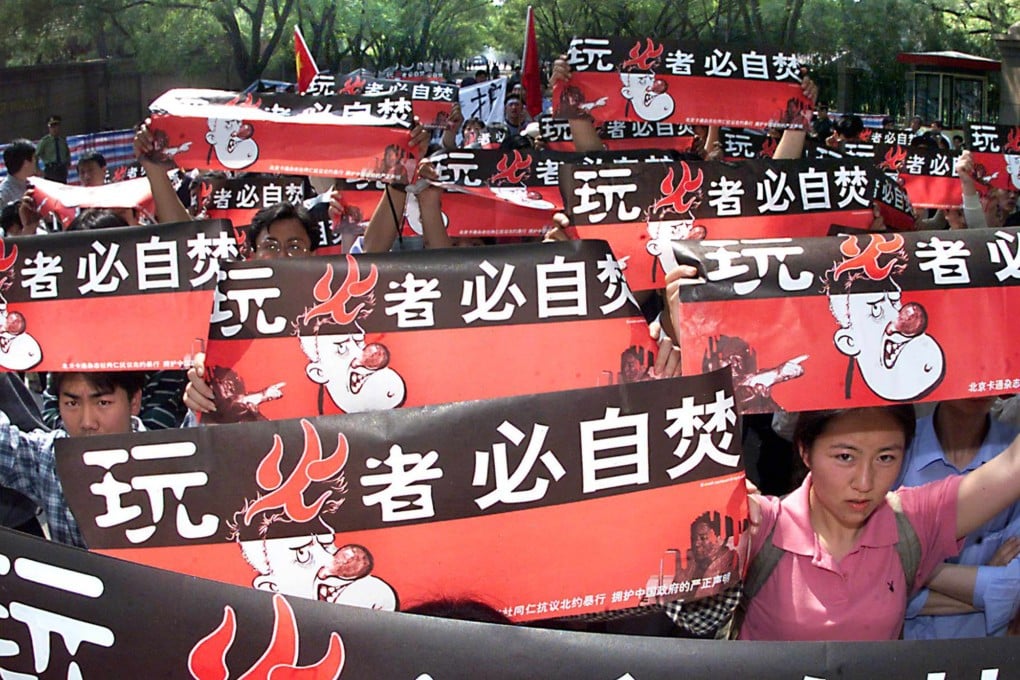 After the 1999 airstrike on the Chinese embassy as part of Nato’s campaign against the former Yugoslavia, protesters marched on the US embassy in Beijing, with banners warning then president Bill Clinton that “those who play with fire get burned”. Photo: AFP
