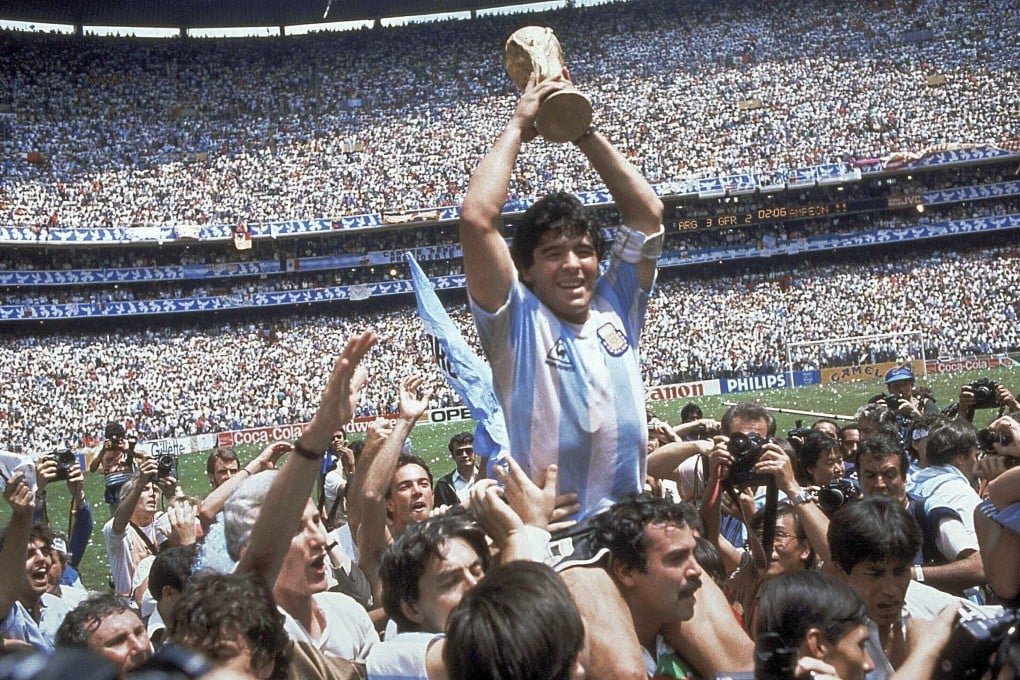 Diego Maradona holds up the World Cup after Argentina’s 3-2 over West Germany in the final at Azteca Stadium in Mexico City. Photo: AP