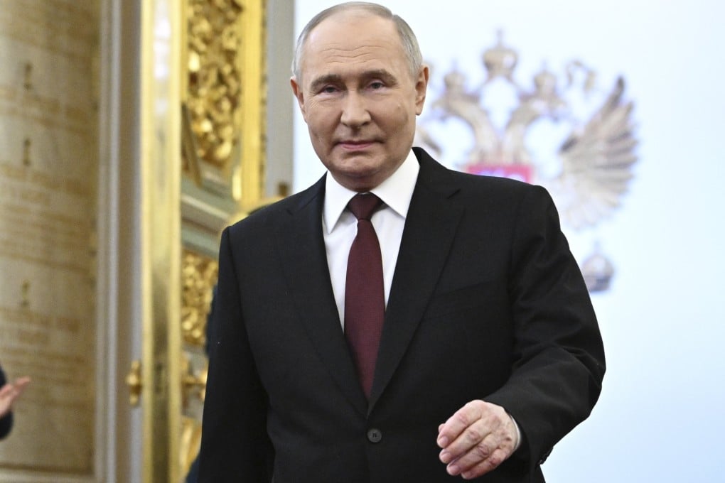Vladimir Putin arrives for an inauguration ceremony to begin his fifth term as Russian president in the Grand Kremlin Palace in Moscow on Tuesday. Photo: Sputnik, Kremlin Pool Photo via AP