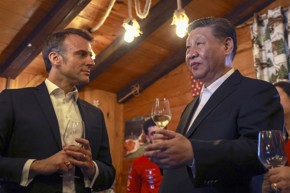 Chinese President Xi Jinping with his host and counterpart Emmanuel Macron at a restaurant in the Pyrenees mountains on Tuesday. Photo: AP