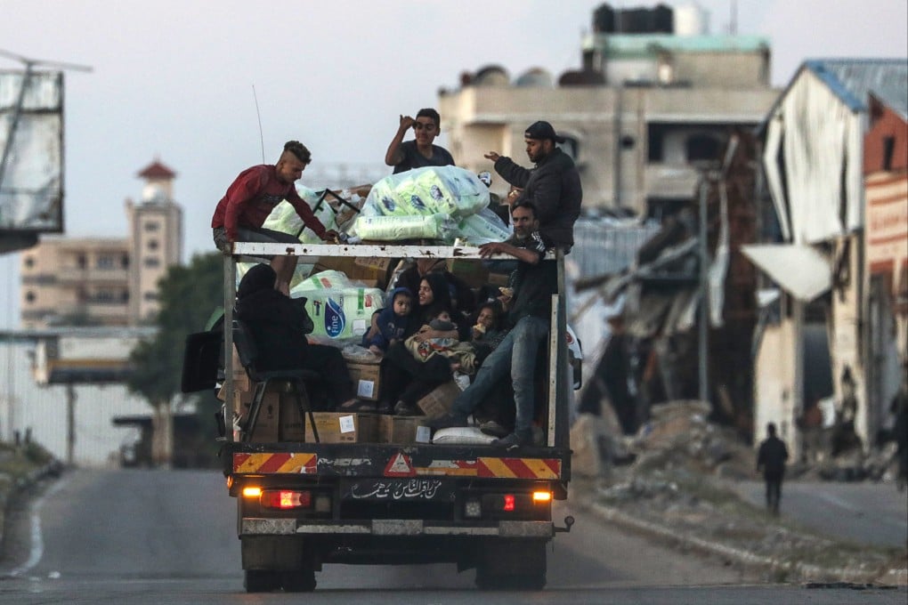 Palestinians leave with their belongings following an evacuation order issued by the Israeli army in the southern Gaza city of Rafah on Monday. Photo: EPA-EFE