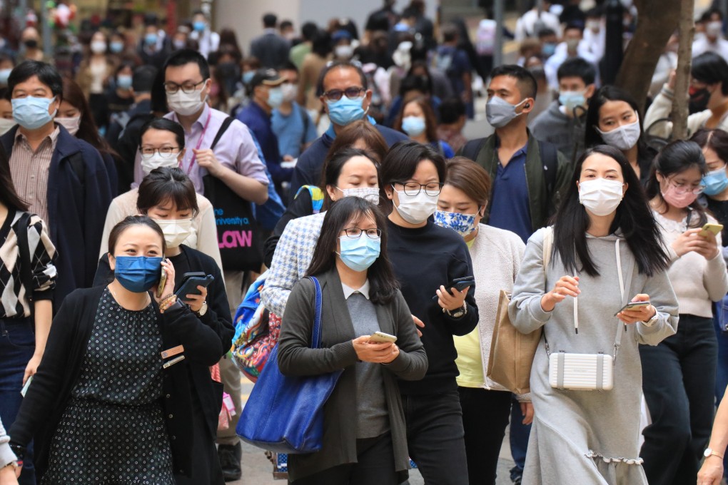 Mask-wearing Hong Kong residents 
in Causeway Bay in 2021 at the height of the Covid-19 pandemic. Photo: Felix Wong